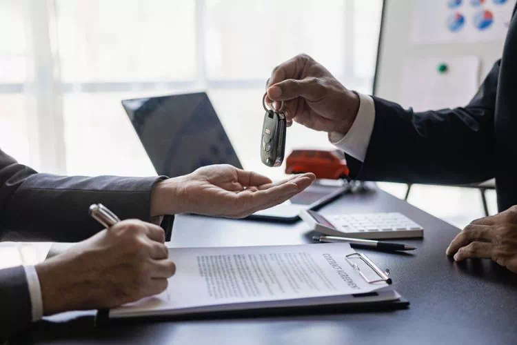 Signature d'un contrat de location de voiture